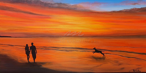 Couple and a dog at the beach